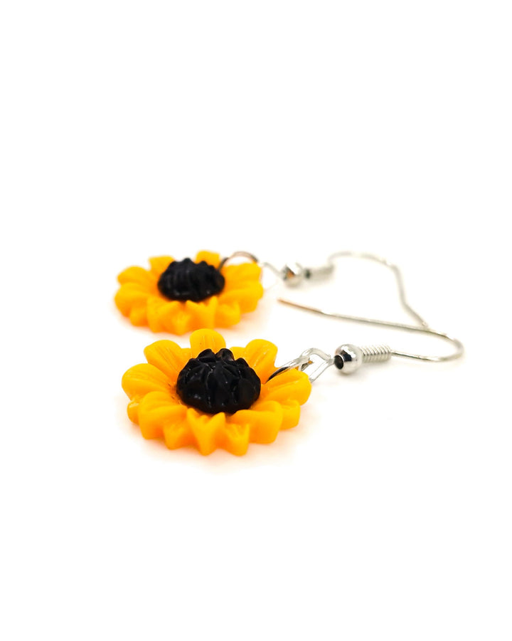 Side view of yellow sunflower drop earrings in 18mm size with stainless steel hooks