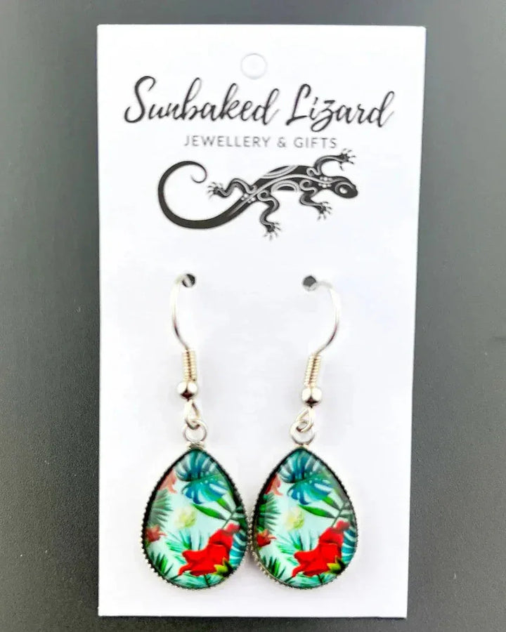 Tropical red flower teardrop drop earrings on Sunbaked Lizard card