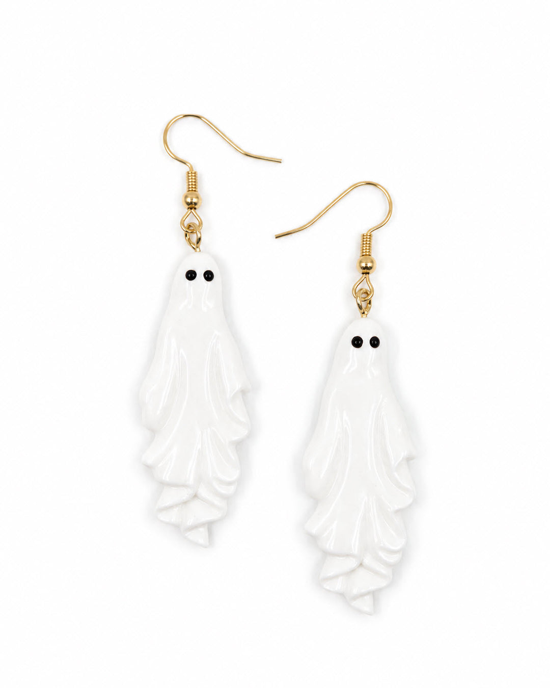 White ghost Halloween earrings with gold hooks on a white background, featuring layered sheet ghost charms and black eyes