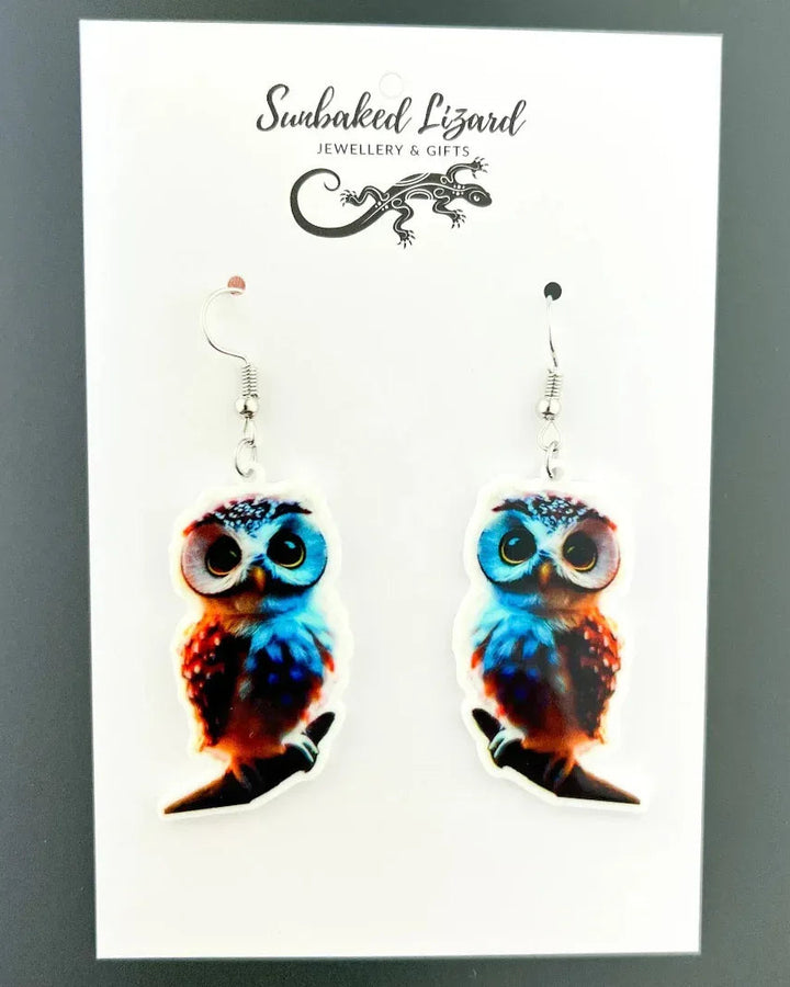 Wise Owl drop earrings on a Sunbaked Lizard backing card, ready to gift