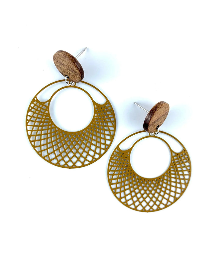 Mustard filigree round earrings with timber stud top and cut-out lattice circle drop on white background