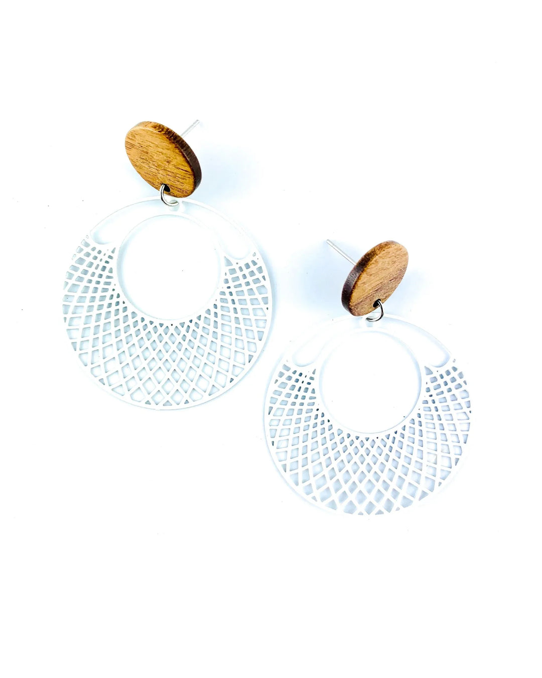 White filigree round earrings with timber stud top and cut-out lattice circle drop on white background