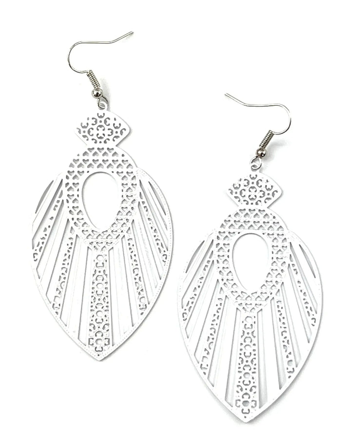 White filigree queen statement earrings with ornate cut-out pattern and long drop shape