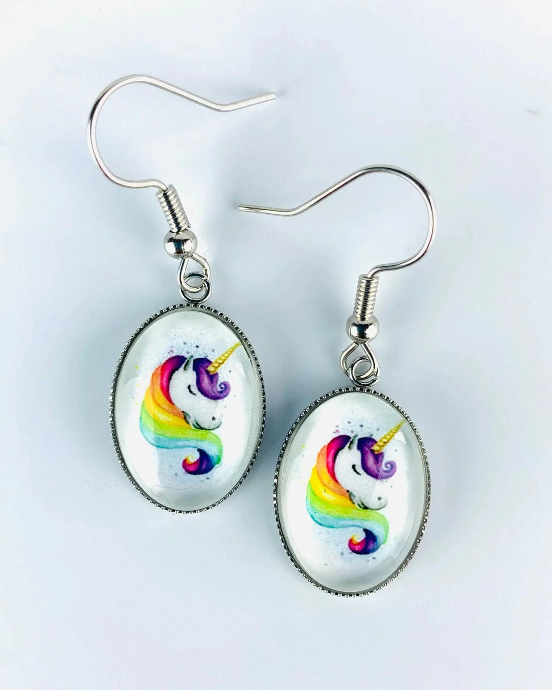 Rainbow unicorn earrings with colourful unicorn design and glass cabochon