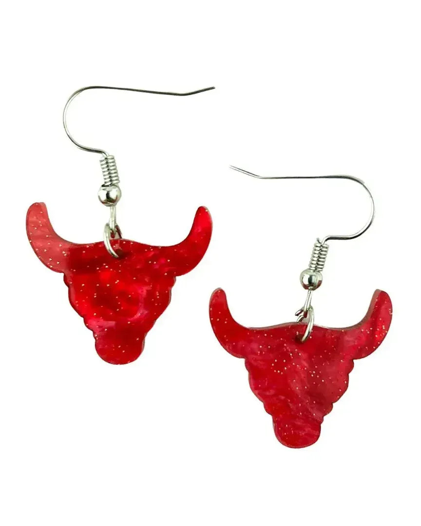 Red glitter bull head drop earrings with silver hooks on white background