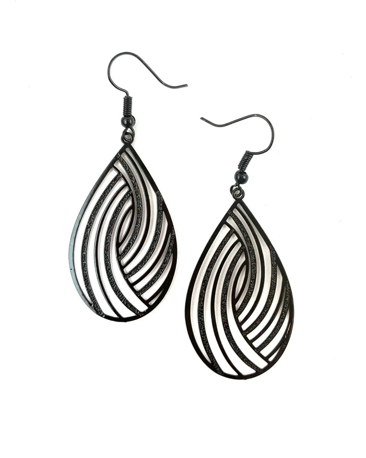 Pair of black swirl cut-out teardrop dangle earrings with curved filigree-style pattern and dark hooks